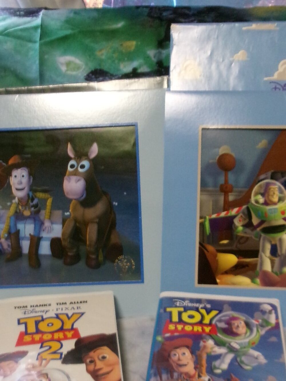 Exclusive Disney Lithographs:Toy Story 1 and 2 with the VHS tapes
